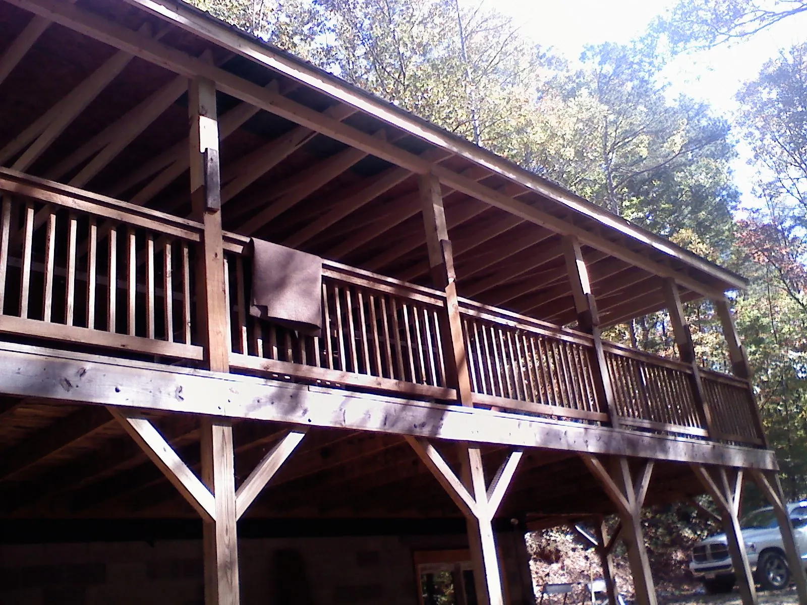 Timber framing under a new elevated porch and deck — Roof Leak Repair in Jefferson by Roofing Brothers